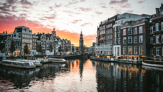 Views of the canals of Amsterdam at sunset.