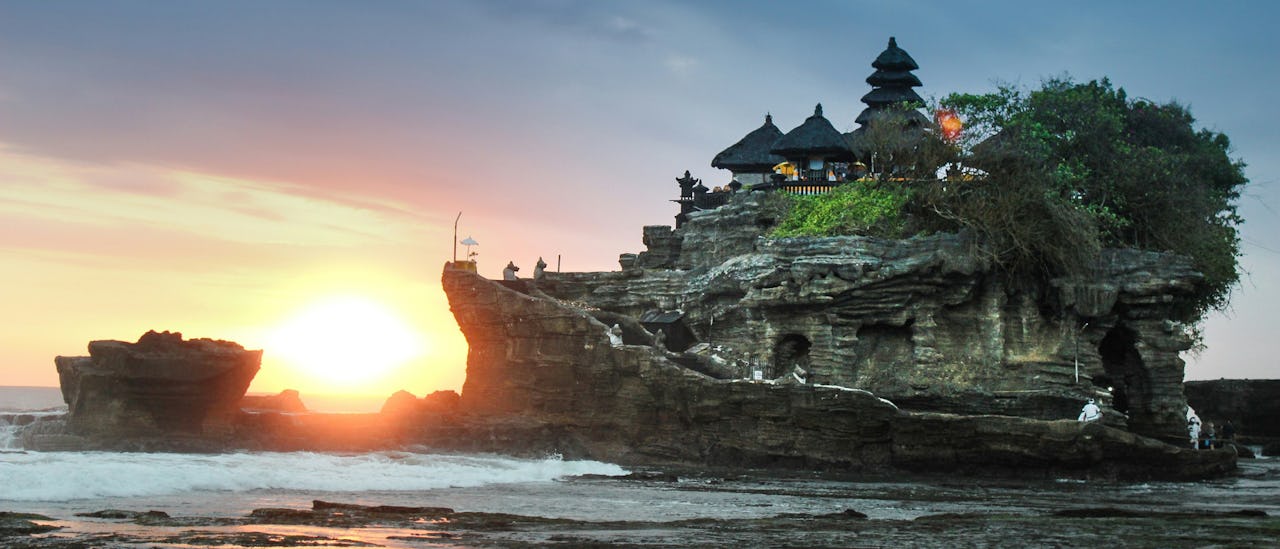 Sunset views of Tanah Lot temple in Bali, Indonesia