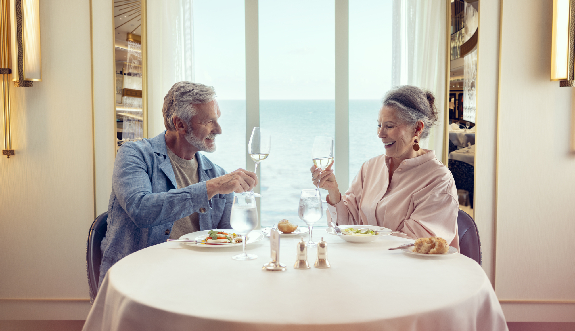 Couple having dinner onboard Cunard's Queen Anne