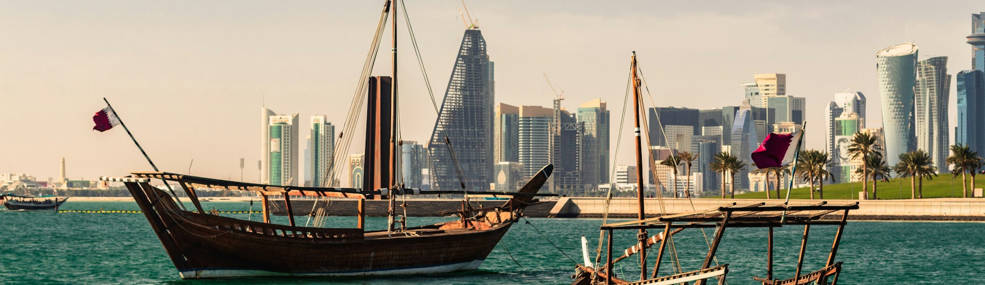 Traditional Qatari boats sailing in the bay of Doha