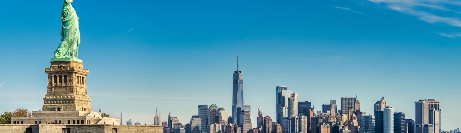 View of the New York skyline with the Statue of Liberty in the foreground