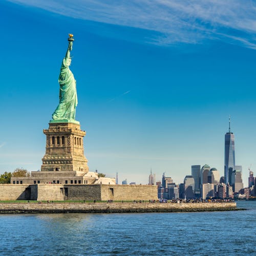 View of the New York skyline with the Statue of Liberty in the foreground
