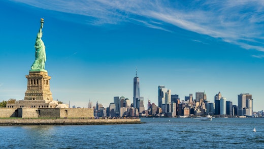 View of the New York skyline with the Statue of Liberty in the foreground