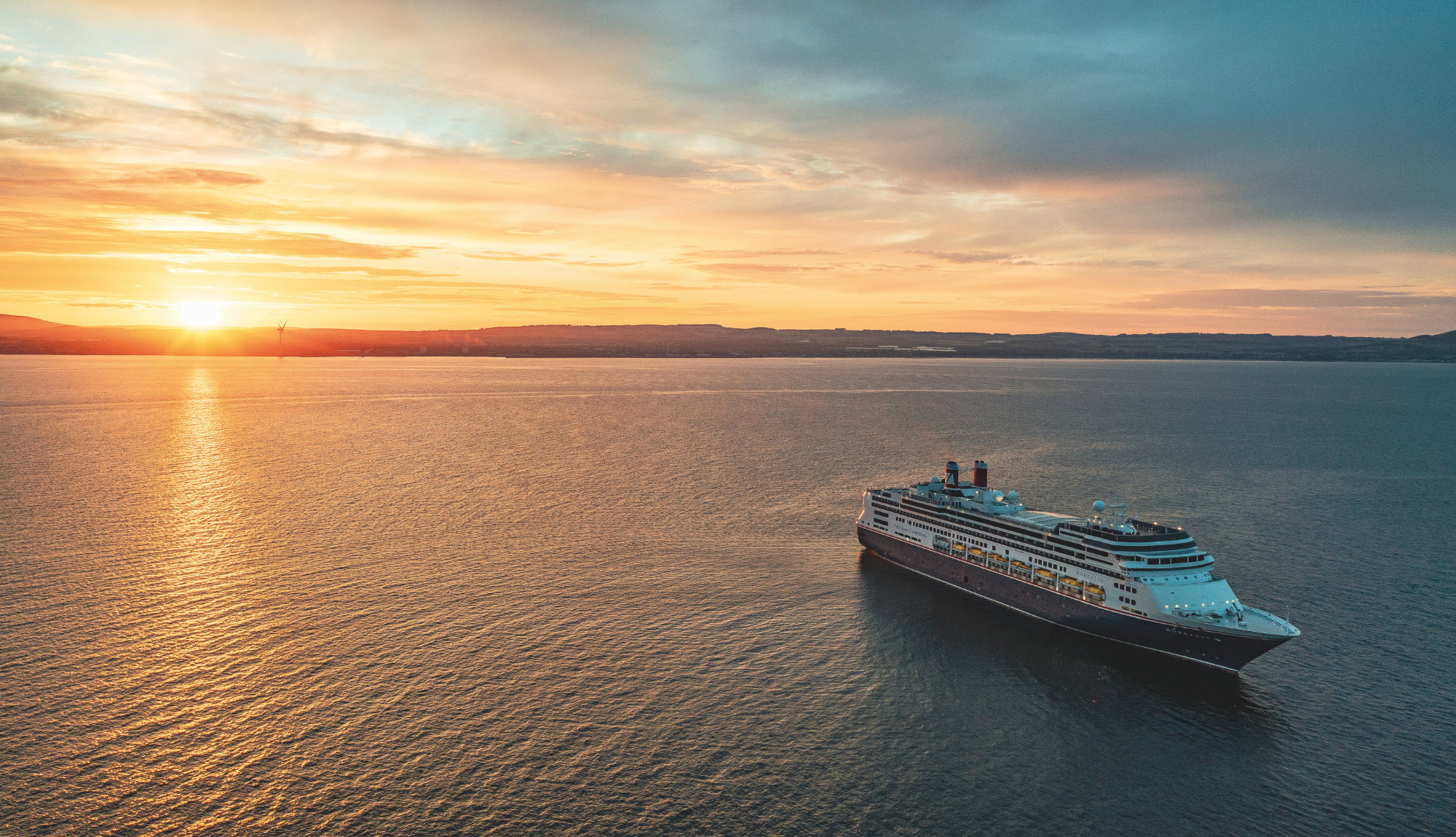 Borealis at Sea at Sunset