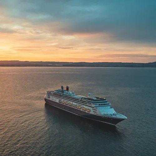 Borealis at Sea at Sunset