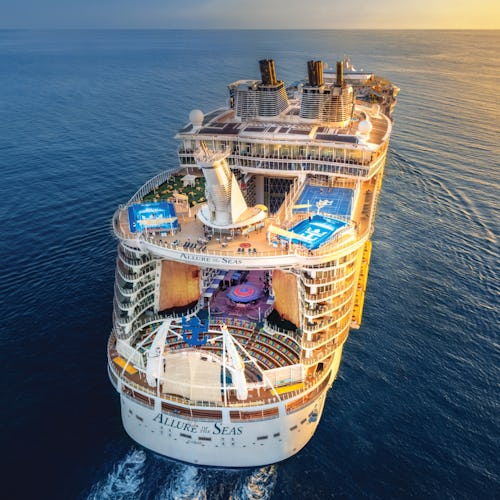 Allure of the Seas sailing into the sunset