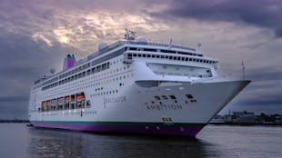 Ambassador Cruise Line's ship Ambition sailing into port