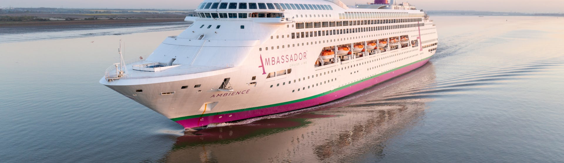 Ambassador Cruise Line's ship Ambience sailing into port