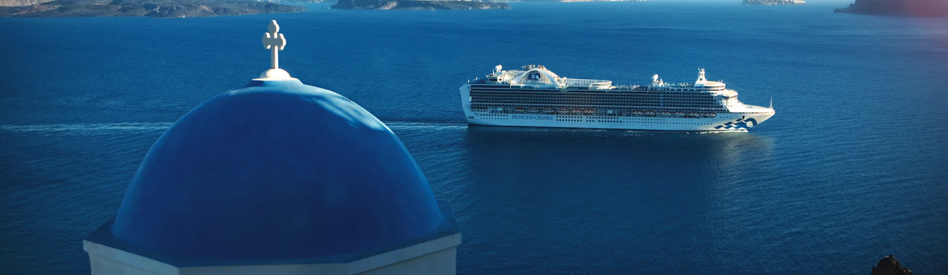 Emerald Princess sailing in Santorini