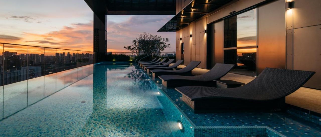 The infinity pool at The Clan hotel, a modern luxury hotel that whispers tales of Singapore's past