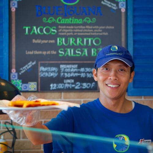 Crew serving food from BlueIguana Cantina