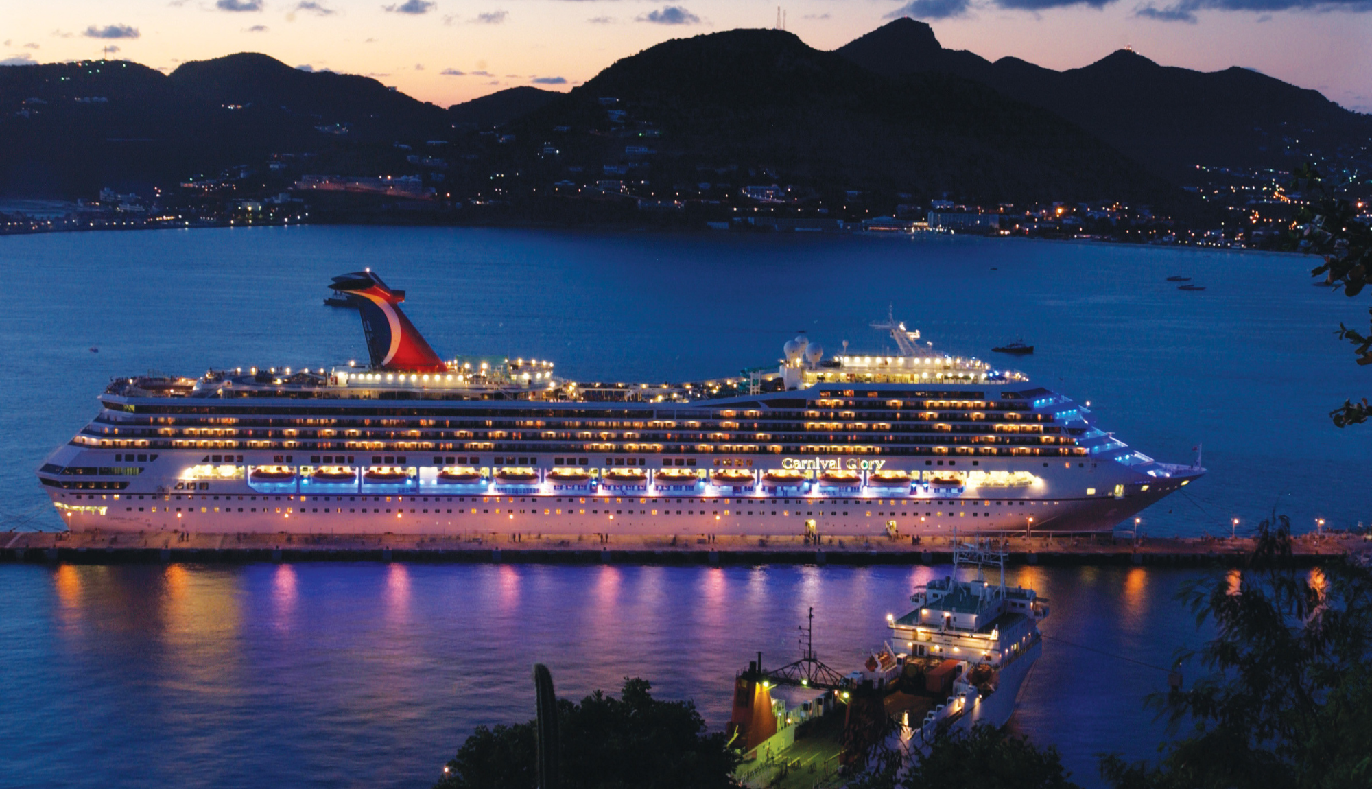 Carnival Glory sailing in St Maarten at night
