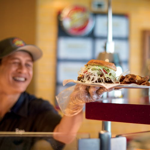 Crew serving food at Guys Burger Joint