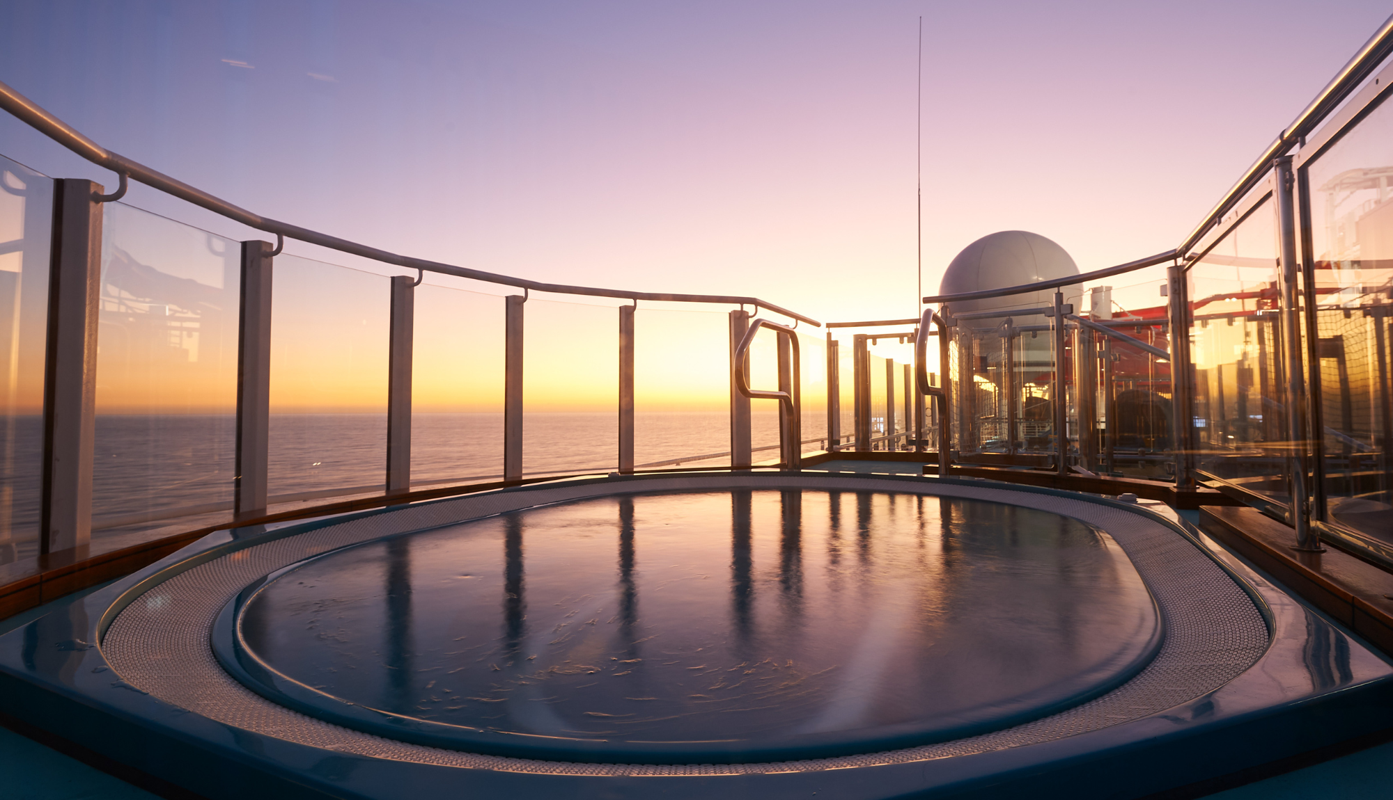 View of a jacuzzi in Serenity at sunset