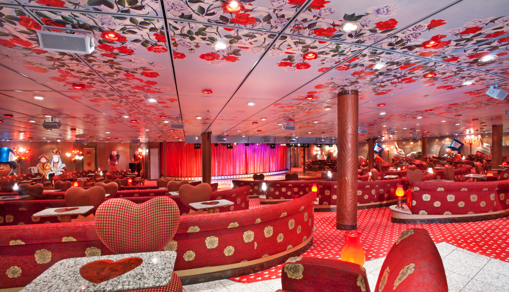 The Mad Hatters Ball lounge onboard Carnival Miracle