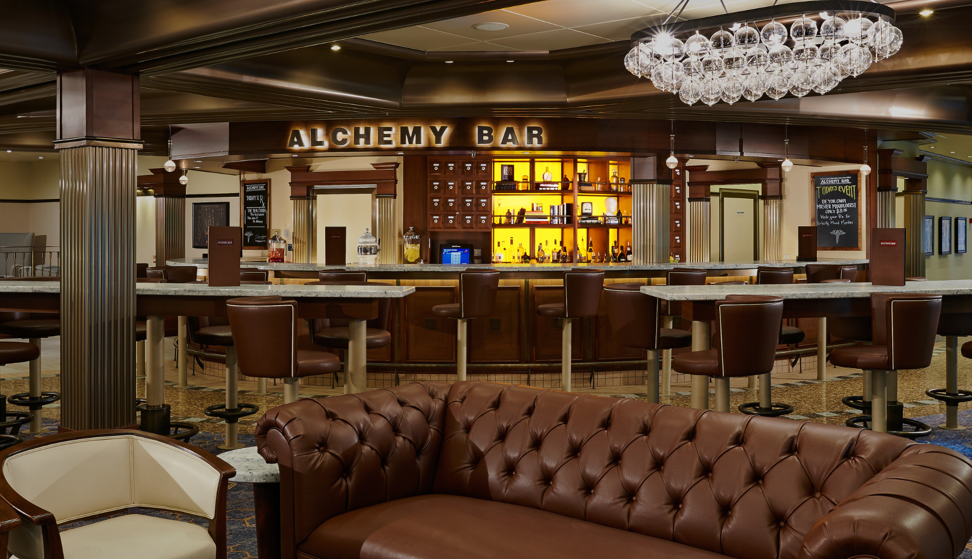 An extended view of the full Alchemy Bar onboard a Carnival ship