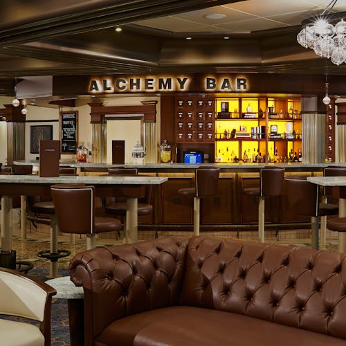 An extended view of the full Alchemy Bar onboard a Carnival ship
