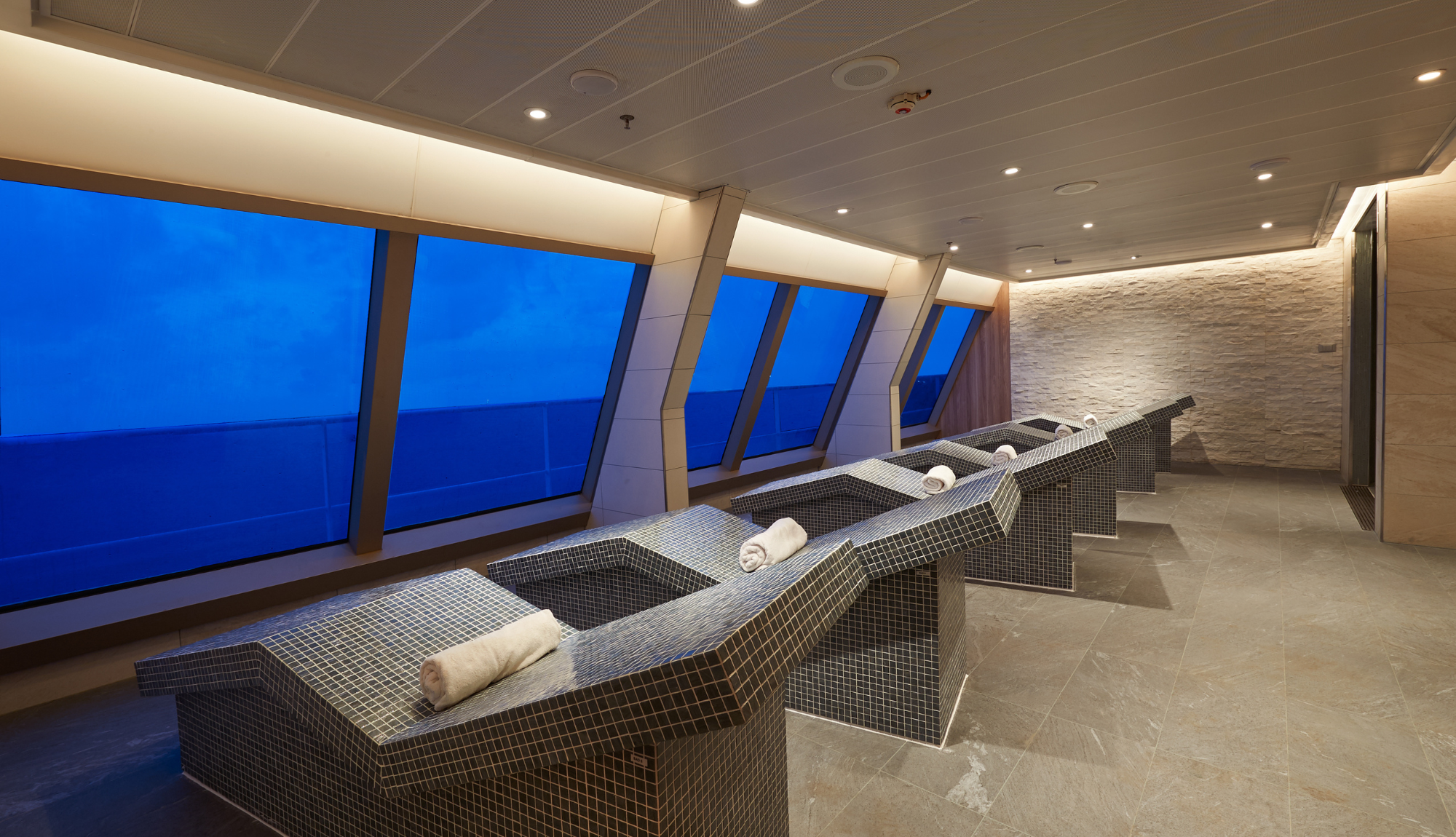 Hot stone beds in Cloud 9 Spa looking out to sea