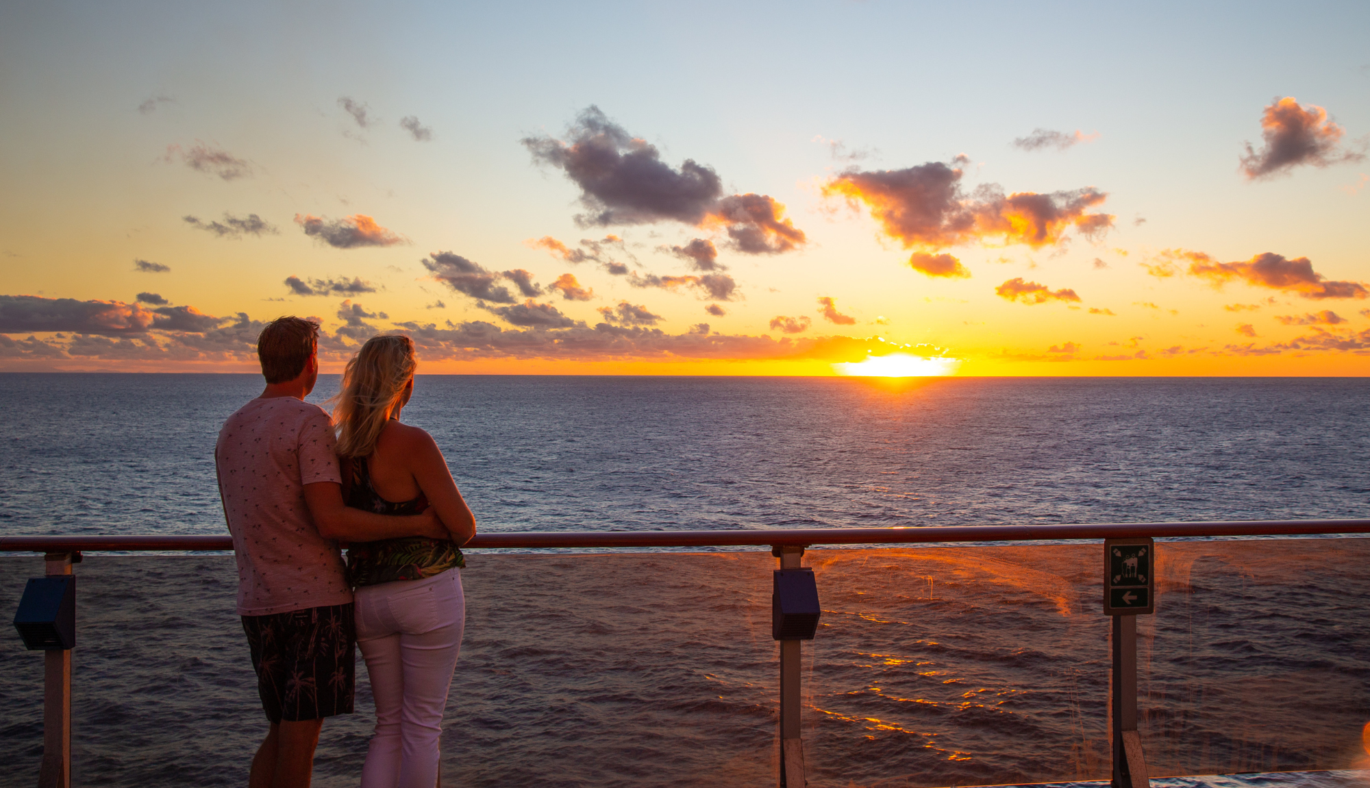 Could enjoying the sunset and looking out to sea