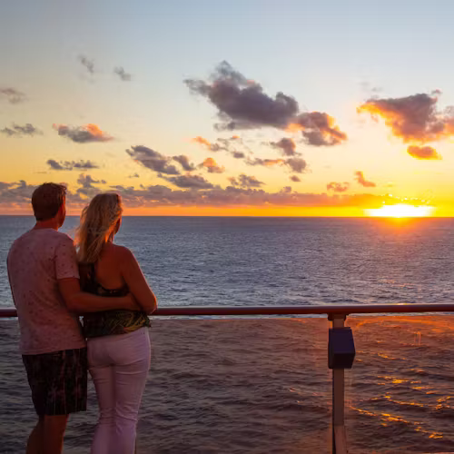 Could enjoying the sunset and looking out to sea