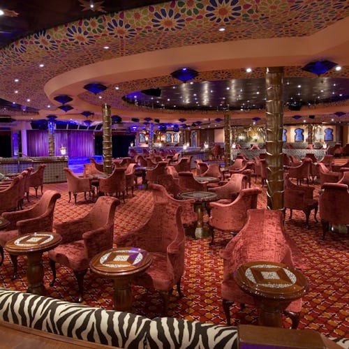 Decor and seating of El Morocco Lounge at the aft of Carnival Splendor