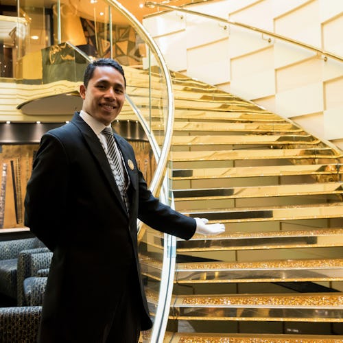 MSC Yacht Club - Butler by the stairs