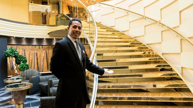 MSC Yacht Club - Butler by the stairs