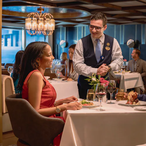 Guests enjoing dinner in the exclusive Sanctuary Restaurant on Princess