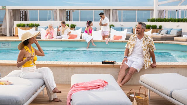 Guests relaxing by the pool on Princess Cruises