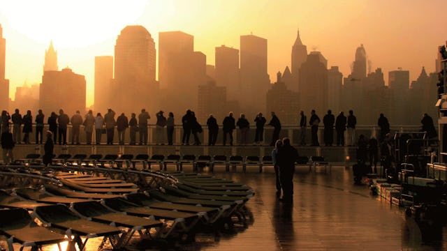 Passengers on deck as Cunard's Queen Mary 2 arrives into New York
