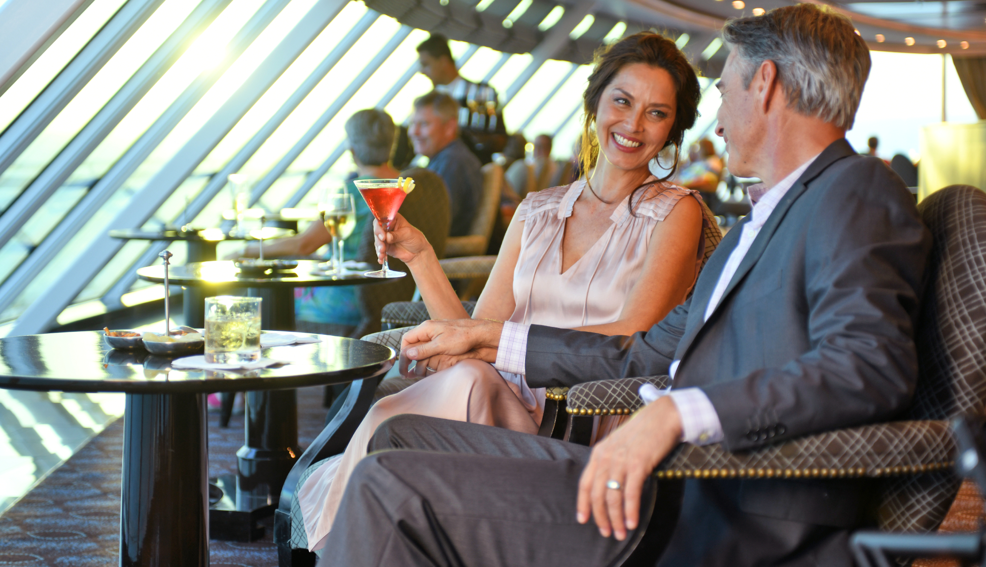 Oceania Cruises Drinks Packages - Couple Enjoying Cocktails in the Horizons Bar
