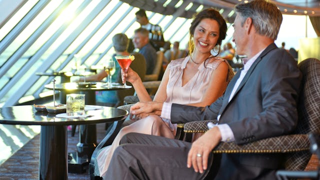 Oceania Cruises Drinks Packages - Couple Enjoying Cocktails in the Horizons Bar