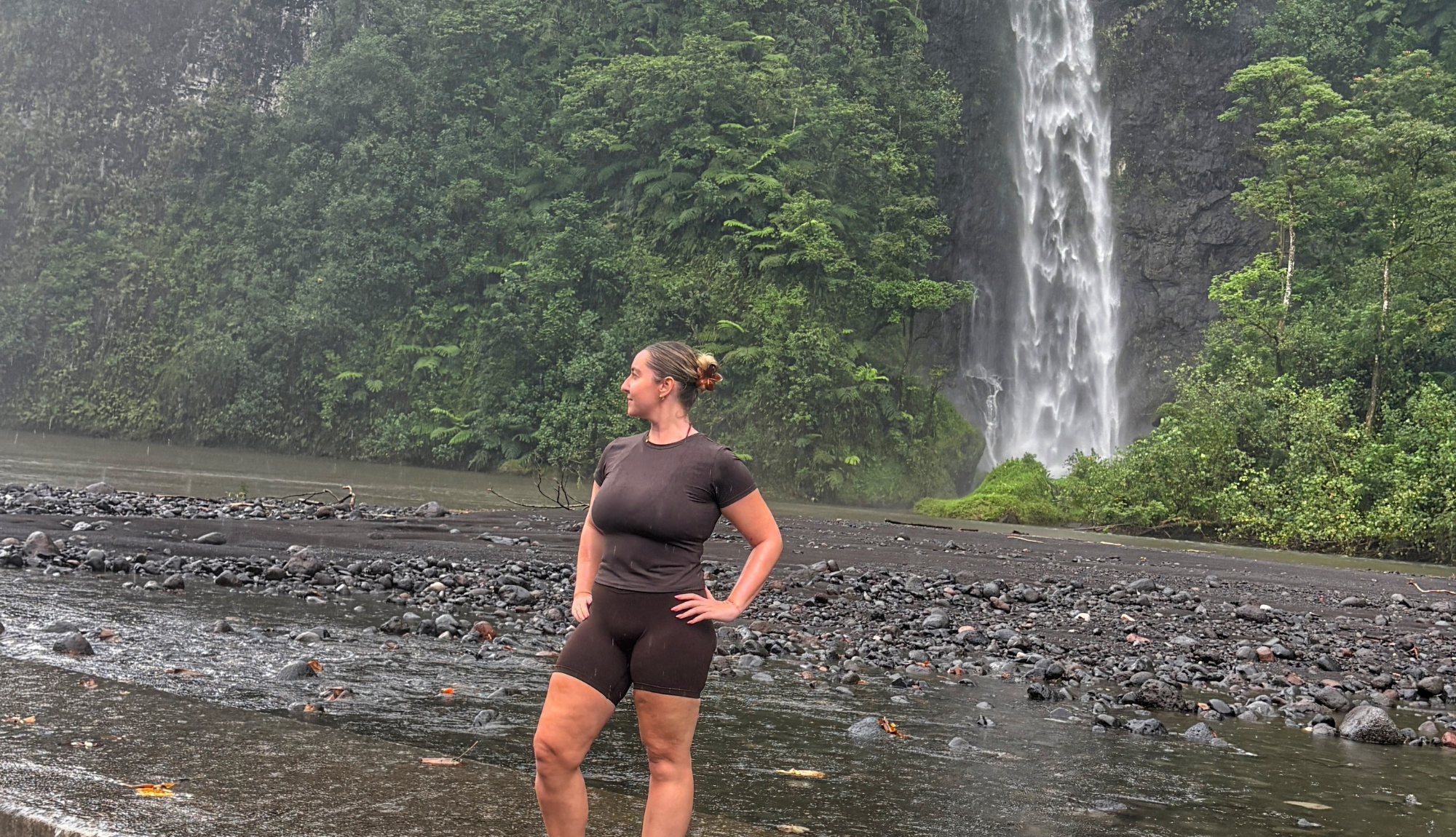 Caitlin in Tahiti by the waterfall
