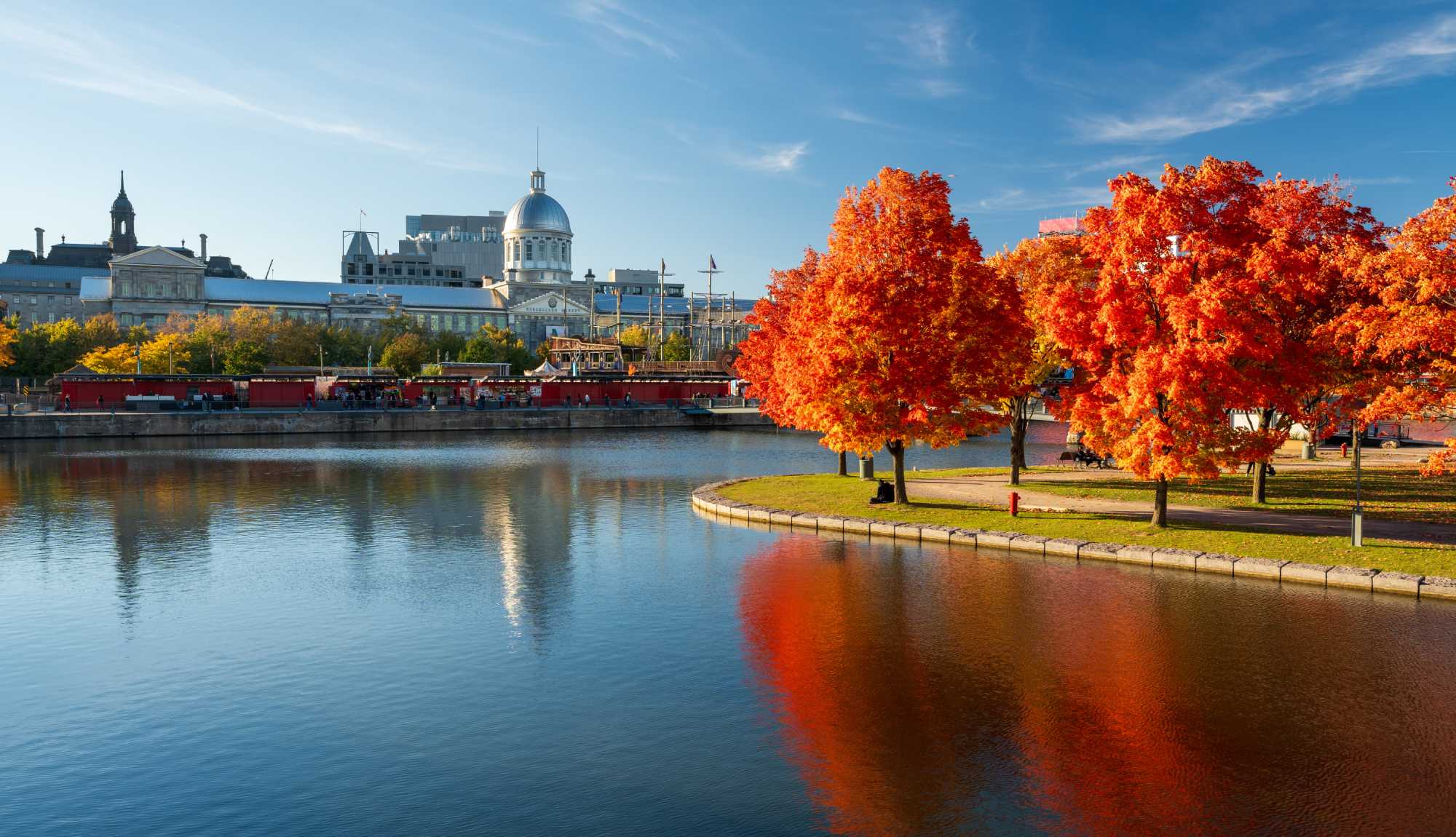 Montreal, Quebec - skyline reflected on St. Lawrence River