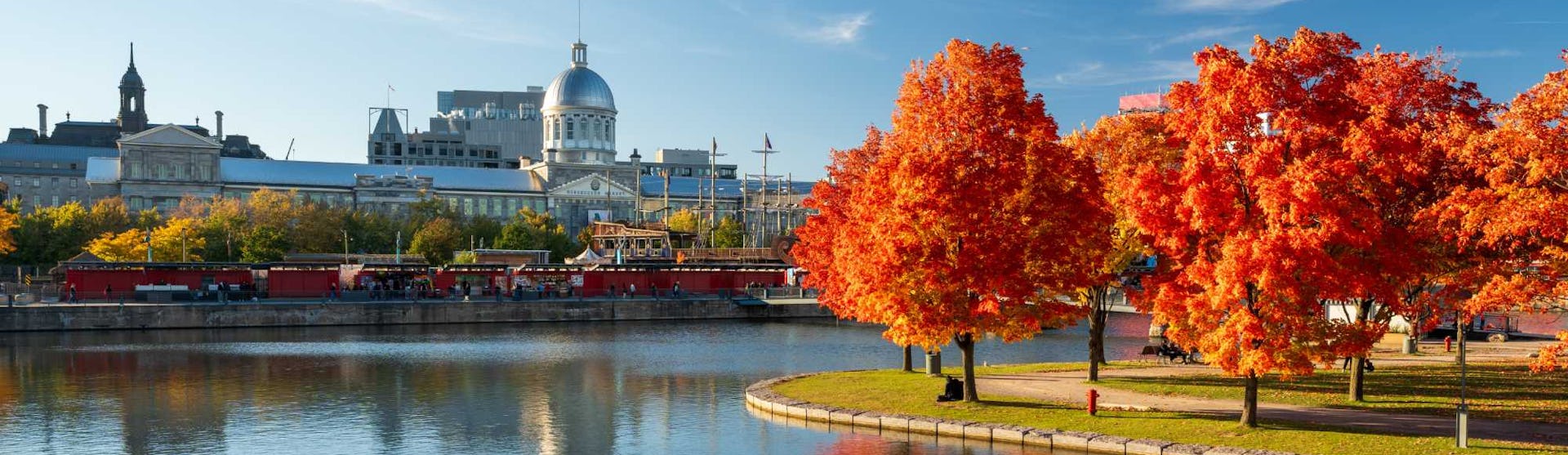 Montreal, Quebec - skyline reflected on St. Lawrence River