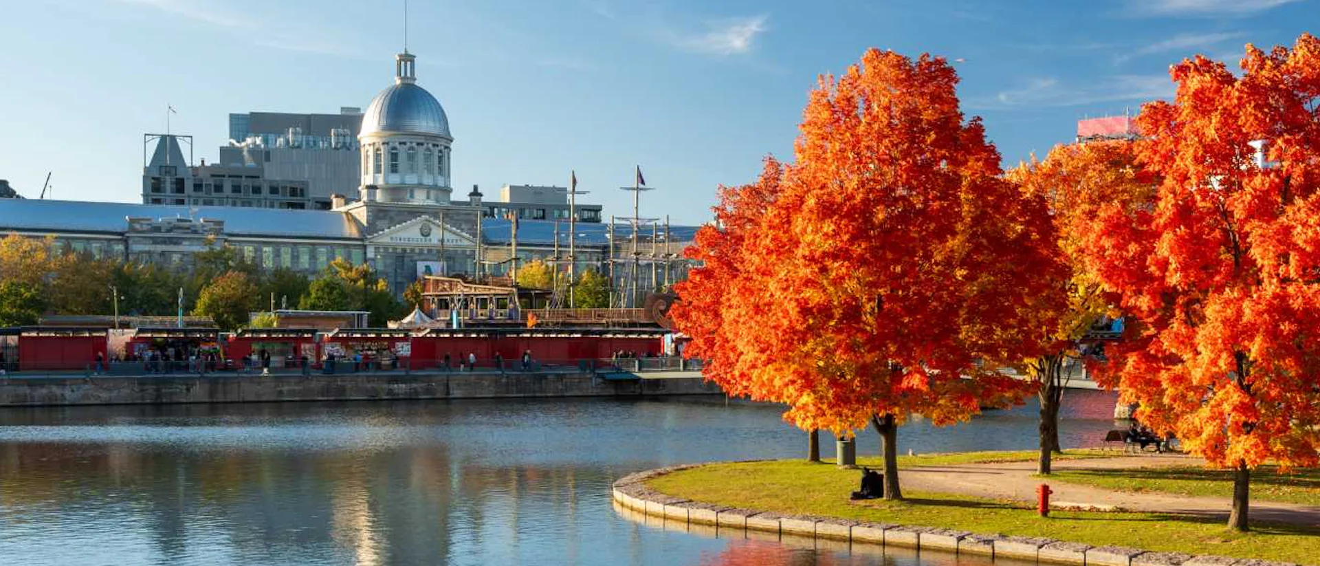 Montreal, Quebec - skyline reflected on St. Lawrence River