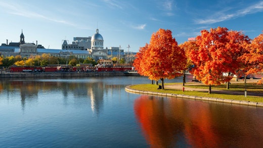 Montreal, Quebec - skyline reflected on St. Lawrence River