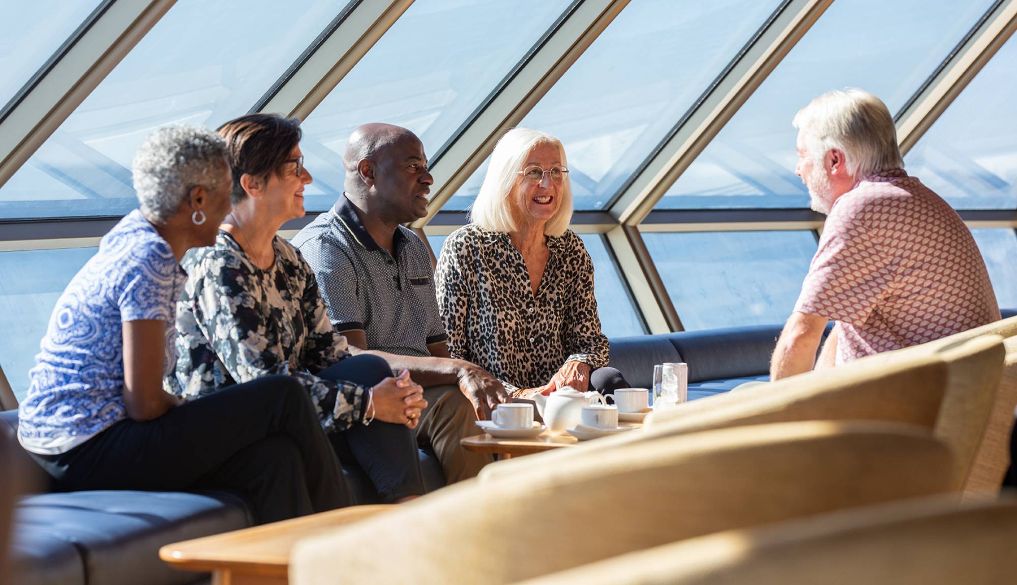 Fred. Olsen Cruise Lines Solo Cruising - Solo Guests chatting in the Observatory lounge on Bolette
