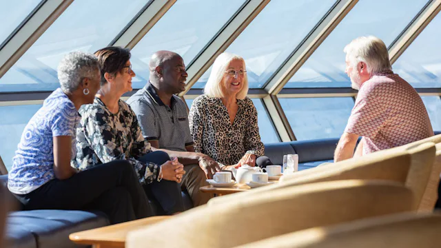 Fred. Olsen Cruise Lines Solo Cruising - Solo Guests chatting in the Observatory lounge on Bolette