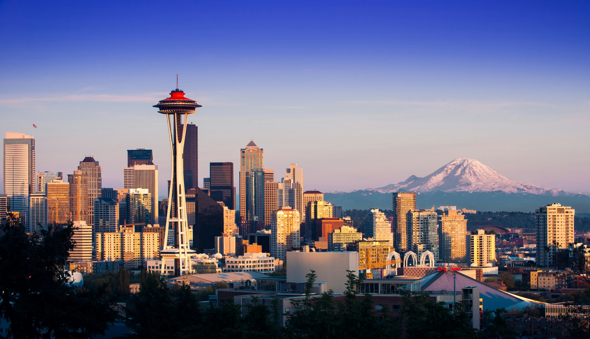 Seattle's skyline with mountains in the background